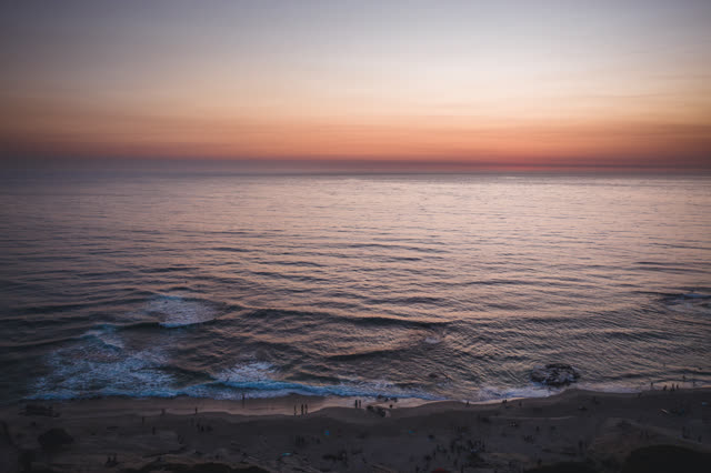 Aerial view of the beach, the surf and the ocean at Windansea.