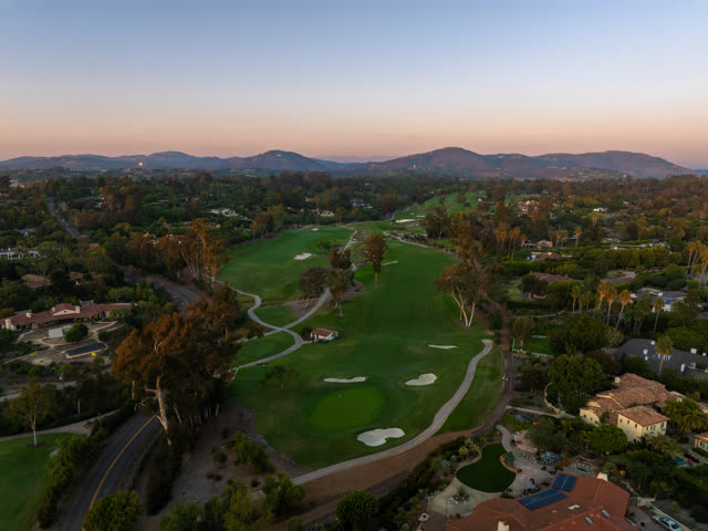 Aerial view of the country inland, palm trees and homes at Covenant.