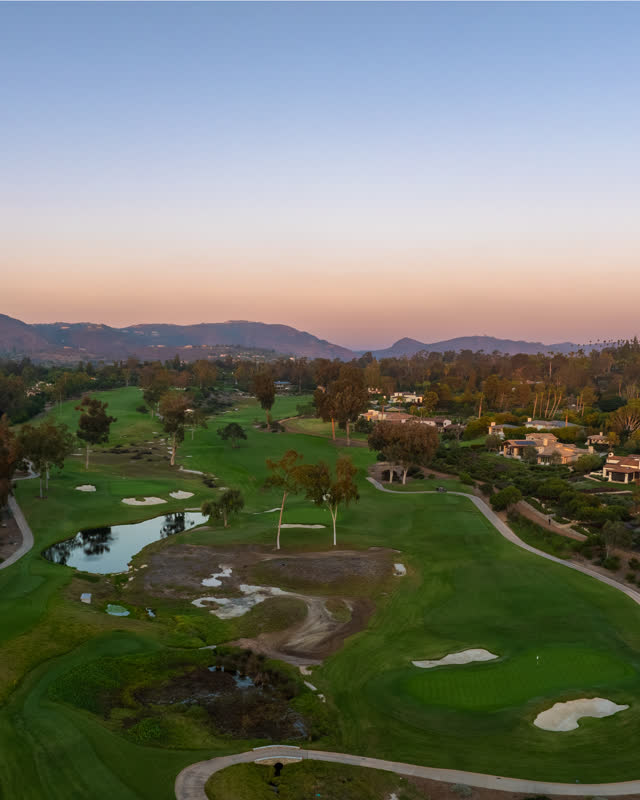 Aerial view of the country inland, palm trees and homes at Covenant.