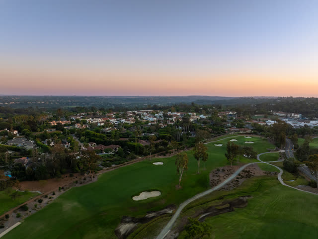Aerial view of the country inland, palm trees and homes at Covenant.