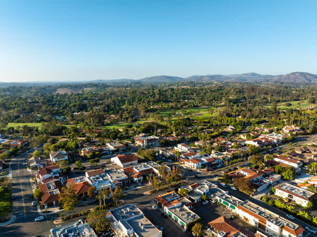 Aerial view of a residential street, homes and the buildings at Covenant.