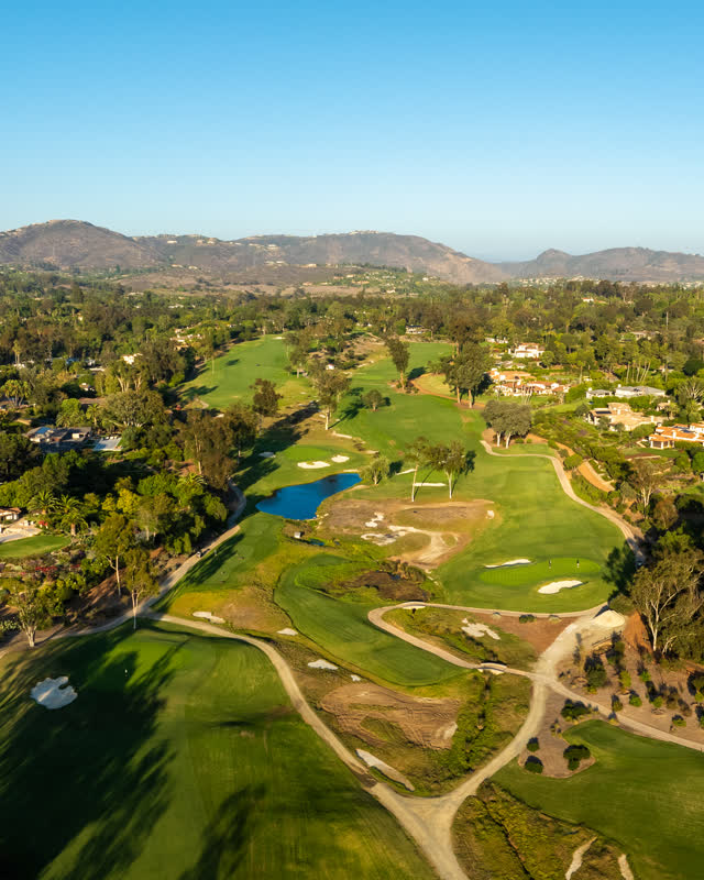 Aerial view of the country inland, palm trees and homes at Covenant.