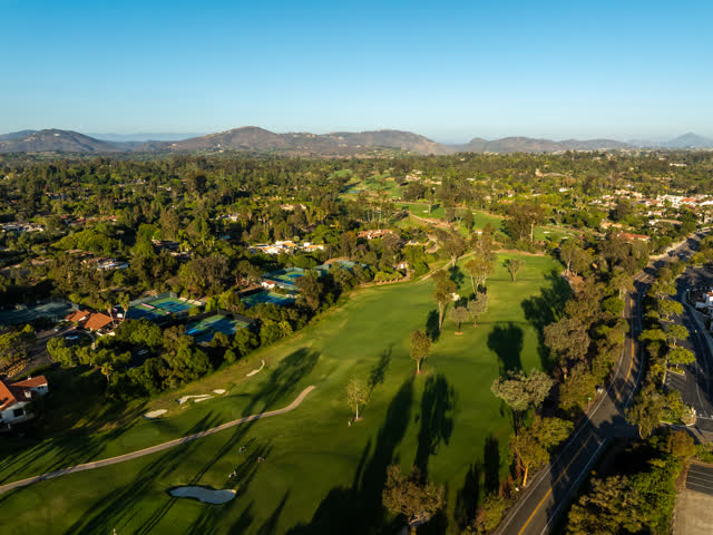 Aerial view of the country inland, palm trees and homes at Covenant.