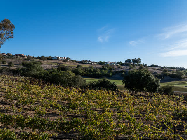 The country inland, homes and traffic in Santaluz.