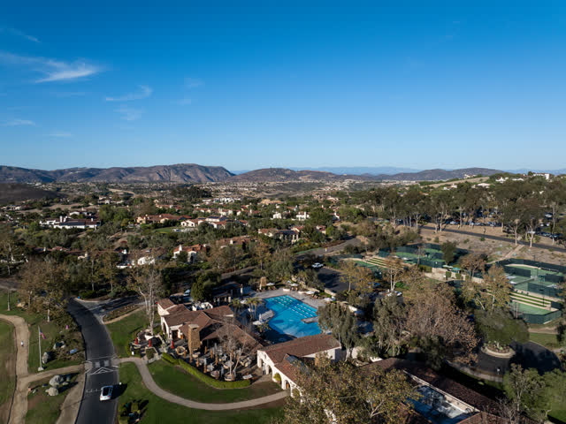 Aerial view of a residential street, homes and the buildings in Santaluz.