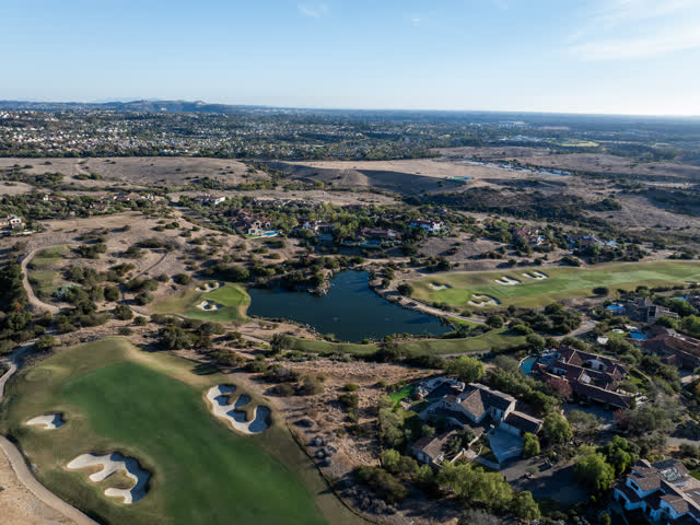 Aerial view of the country inland, homes and the buildings in Santaluz.