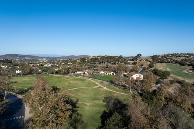 Aerial view of the country inland, homes and the buildings in Santaluz.