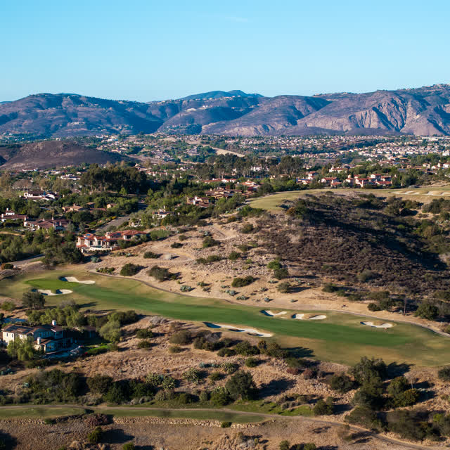 Aerial view of the country inland, homes and the buildings in Santaluz.