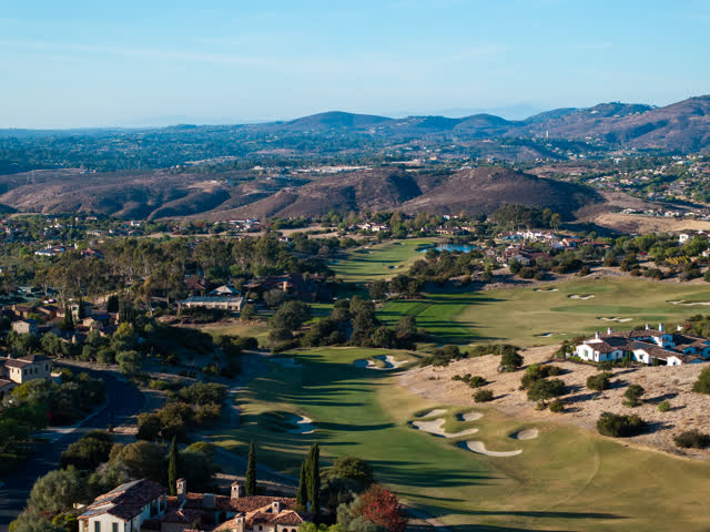 Aerial view of the country inland, homes and the buildings in Santaluz.
