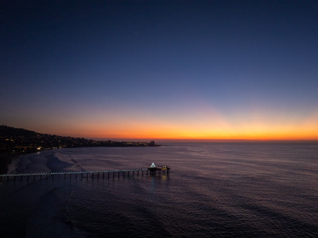 Aerial view of the beach, the pier and the ocean at La Jolla Shores.