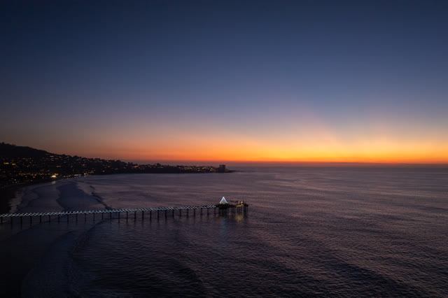 Aerial view of the beach, the pier and the ocean at La Jolla Shores.