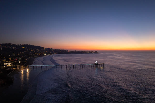 Aerial view of the beach, the pier and the ocean at La Jolla Shores.