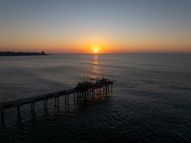 Aerial view of the beach, the pier and the ocean at La Jolla Shores.
