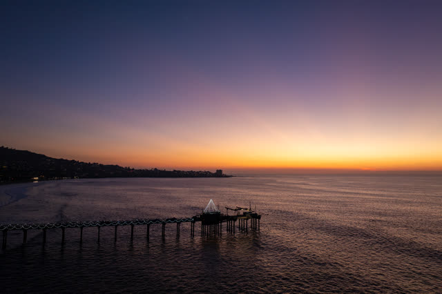 Aerial view of the beach, the pier and the ocean at La Jolla Shores.