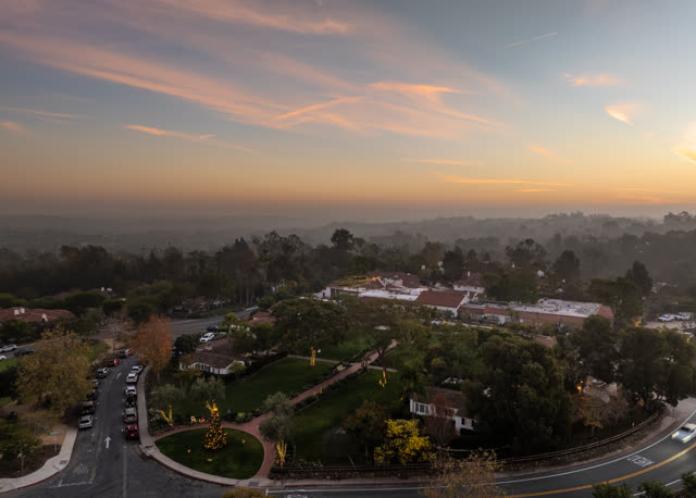 Aerial view of a residential street, homes and traffic at Covenant.