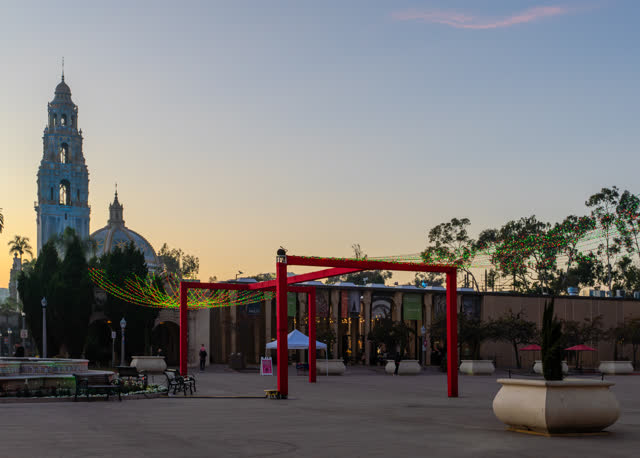 A park, palm trees and the buildings in Balboa Park.