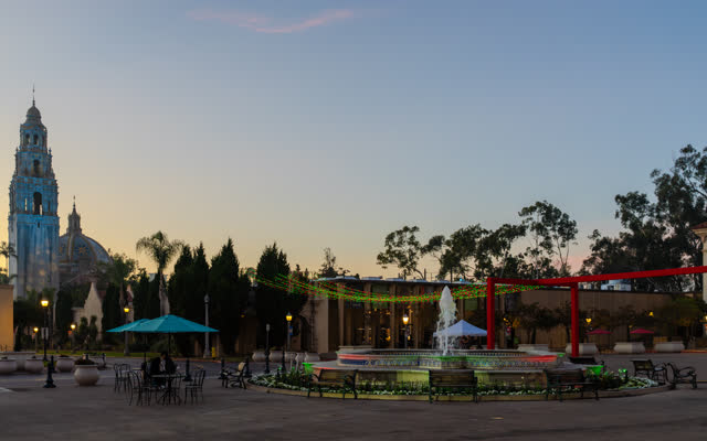 A park, palm trees and the buildings in Balboa Park.