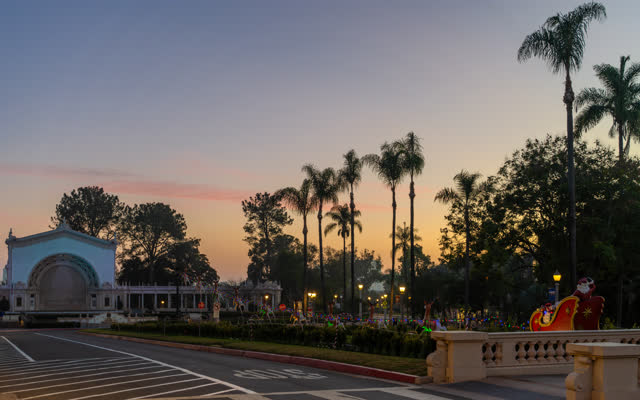 A park, palm trees and the buildings in Balboa Park.