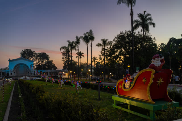 A park, palm trees and the buildings in Balboa Park.