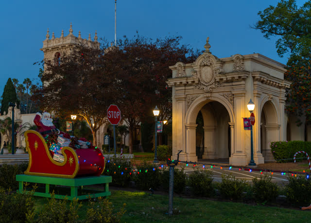 A park, palm trees and the buildings in Balboa Park.