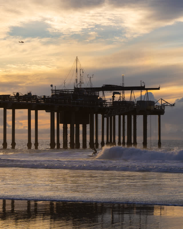 Evening sunset photo at Scripps Pier in La Jolla Shores San Diego California showcasing dramatic light ocean texture and classic coastal landmark | Photo – 36