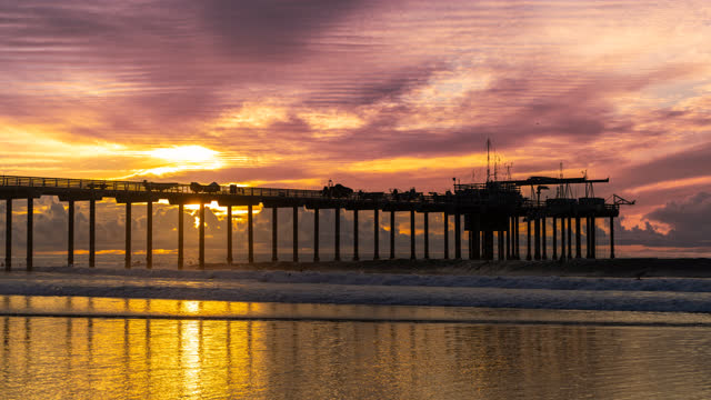 The beach, the surf and the pier at La Jolla Shores.