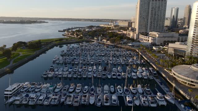 Aerial view of the harbor, the skyline and boats at Marina, with boats out.