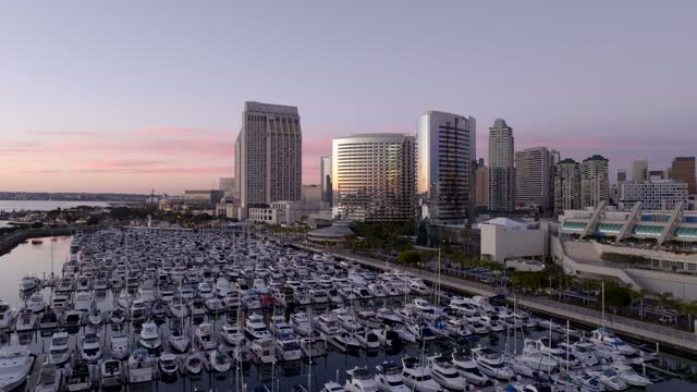 Aerial view of the harbor, the skyline and boats at Marina, with boats out.