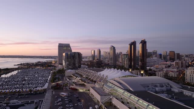 Aerial view of the downtown streets, the skyline and boats at Marina.