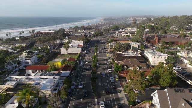 Aerial view of the downtown streets, palm trees and the ocean in Del Mar.