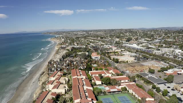 Aerial view of the cliffs, the ocean and homes in Solana Beach.
