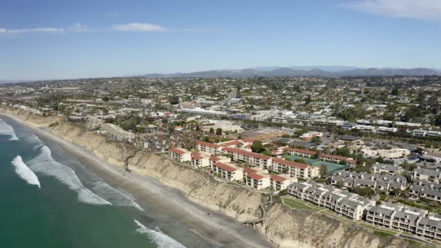 Aerial view of the cliffs, palm trees and the ocean in Solana Beach.