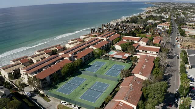 Aerial view of a residential street, the ocean and homes in Solana Beach.