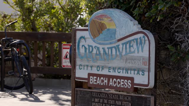 Close view of the beach, traffic and open country at Leucadia.