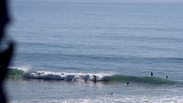 Surfers and the coastline at Grandview Beach in Leucadia Encinitas | Video – 3
