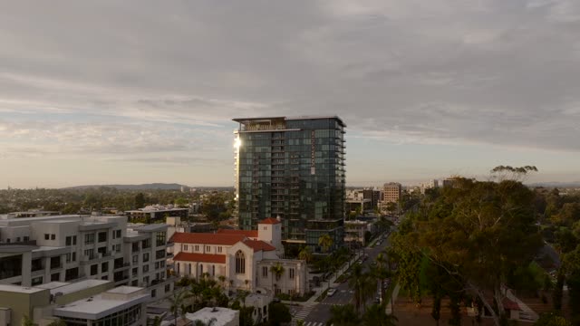 Low aerial view of the downtown streets, homes and the buildings at Bankers Hill.
