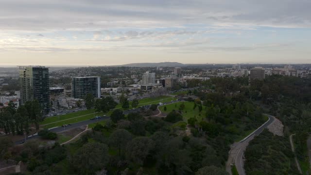 Aerial view of a park, homes and the buildings at Bankers Hill.
