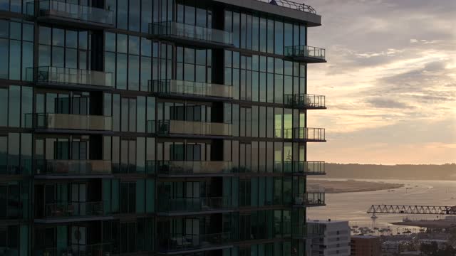 Low aerial view of the downtown streets, boats and the bay at Bankers Hill.