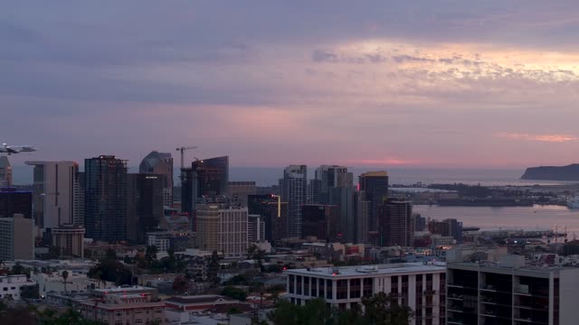 Aerial view of the downtown streets, the skyline and the bay in Downtown San Diego.
