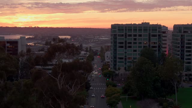 Low aerial view of the downtown streets, homes and the buildings at Bankers Hill.