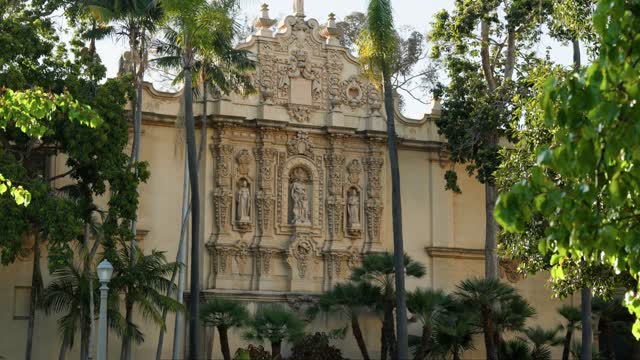A park, palm trees and the buildings in Balboa Park.