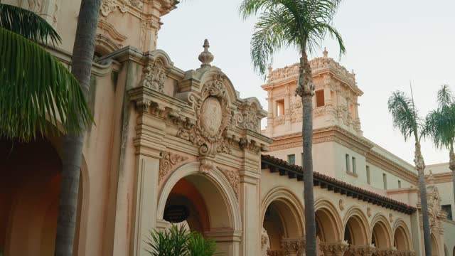 A park, palm trees and the buildings in Balboa Park.