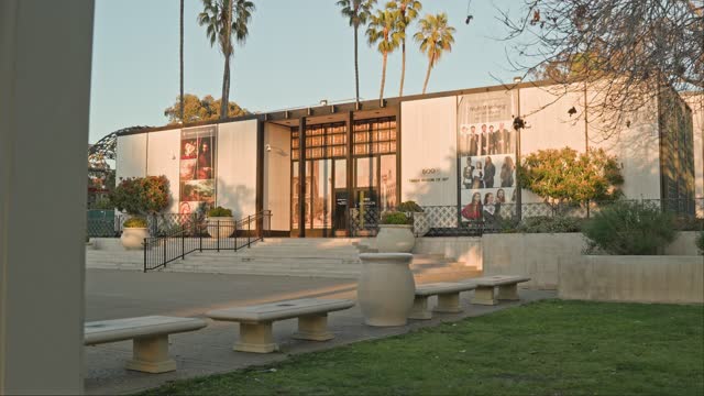 A park, palm trees and the buildings in Balboa Park.