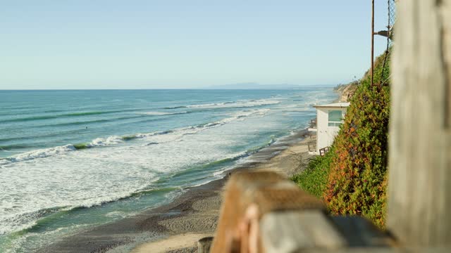Elevated view of the cliffs, the surf and the ocean in Encinitas.