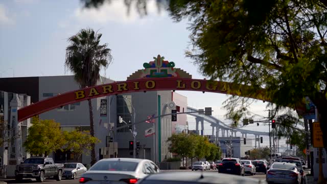 The downtown streets, the bridge and palm trees in Barrio Logan.