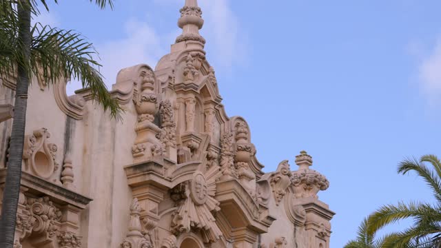 A park, palm trees and the buildings in Balboa Park.