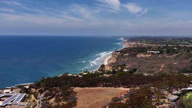 Aerial view of the cliffs, the ocean and the beach at Black’s Beach.