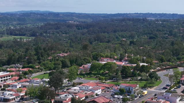 Aerial view of a residential street, homes and the buildings at Covenant.