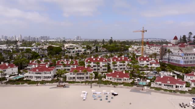 Aerial view of the beach, the bridge and the skyline at Coronado Beach.