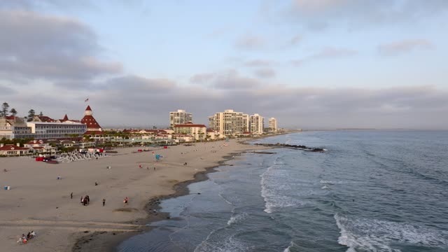 The Hotel Del Coronado at Coronado Beach during Sunset and Twilight in San Diego | Drone Video – 1